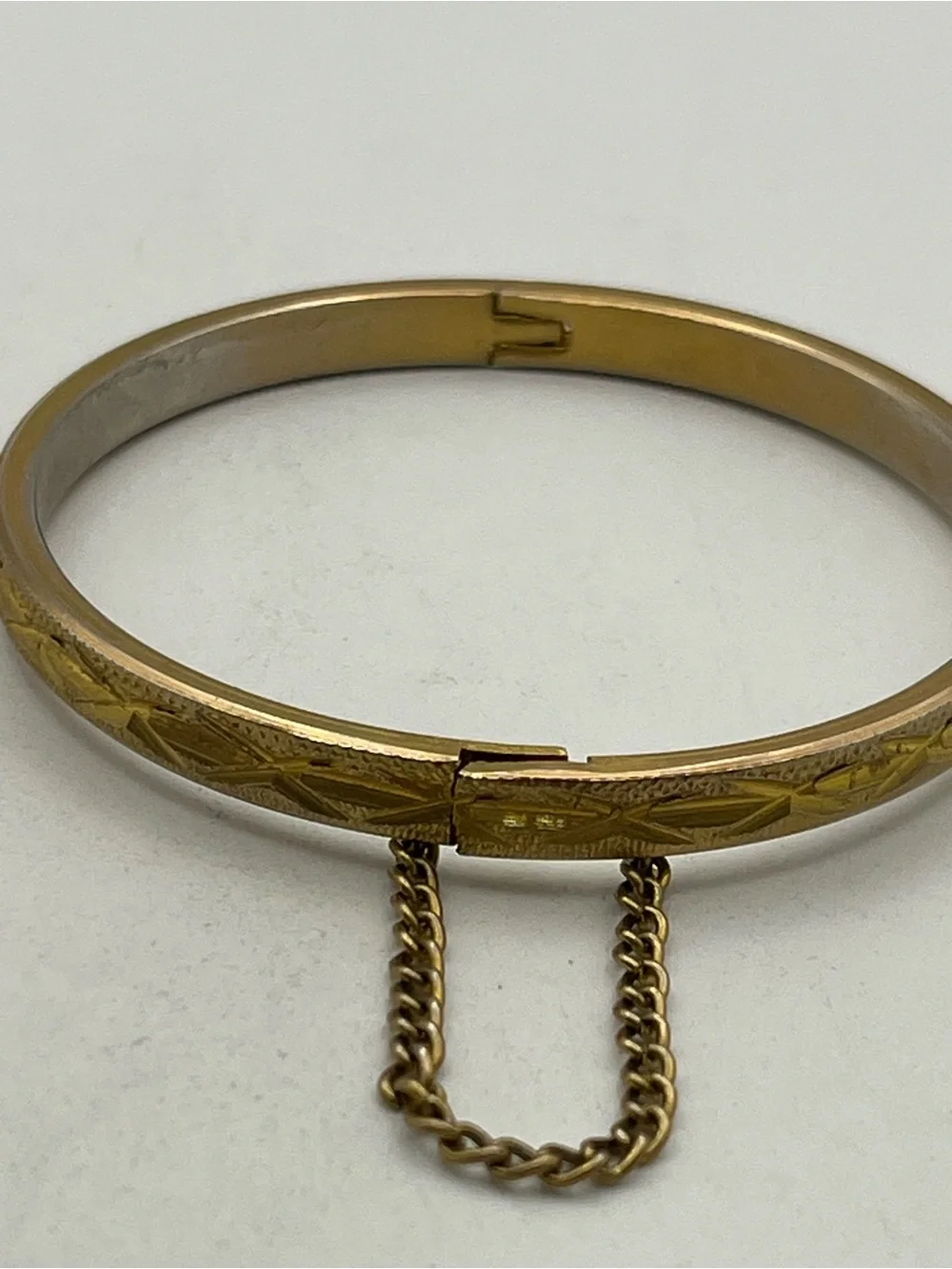 Etched design gold tone small child sized bangle bracelet vintage
